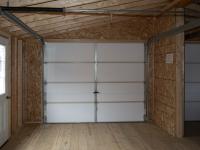 24' x 32' two-car modular garage with vinyl siding and upgraded flooring